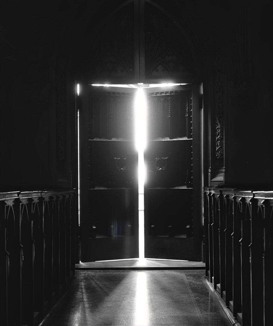 Bright doorway in dark hallway